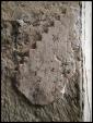 Epigrafies, grafits i altres marques<br>Montmagastre : Grafit a la porta d'accés de l'església. Sobre guix. Algú s'entretení en donar-li aquest tall esglaonat on podem veure diferents objectes, com una llança, feixos de blat potser? i altres elements. Cal dir que la visita paga la pena. Des d'aquí, sortí el gros de l'expedició catalana a Còrdova el 1010. Caldria una vegada més que l'administració hi fes una actuació, si més no, netejar de berdisses que li donen al conjunt un aspecte amaçònic Autor: Jordi Bibià Epigrafies, grafits i altres marques<br>Montmagastre : Grafit a la porta d'accés de l'església. Sobre guix. Algú s'entretení en donar-li aquest tall esglaonat on podem veure diferents objectes, com una llança, feixos de blat potser? i altres elements. Cal dir que la visita paga la pena. Des d'aquí, sortí el gros de l'expedició catalana a Còrdova el 1010. Caldria una vegada més que l'administració hi fes una actuació, si més no, netejar de berdisses que li donen al conjunt un aspecte amaçònic Autor: Jordi Bibià