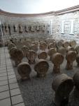 Les esteles funeràries discoïdals de Sanaüja<br>Capella de Santa Magdalena.: Vista parcial del conjunt en la part de l'absi de la capella. Autor: Jordi Bibià Les esteles funeràries discoïdals de Sanaüja<br>Capella de Santa Magdalena.: Vista parcial del conjunt en la part de l'absi de la capella. Autor: Jordi Bibià