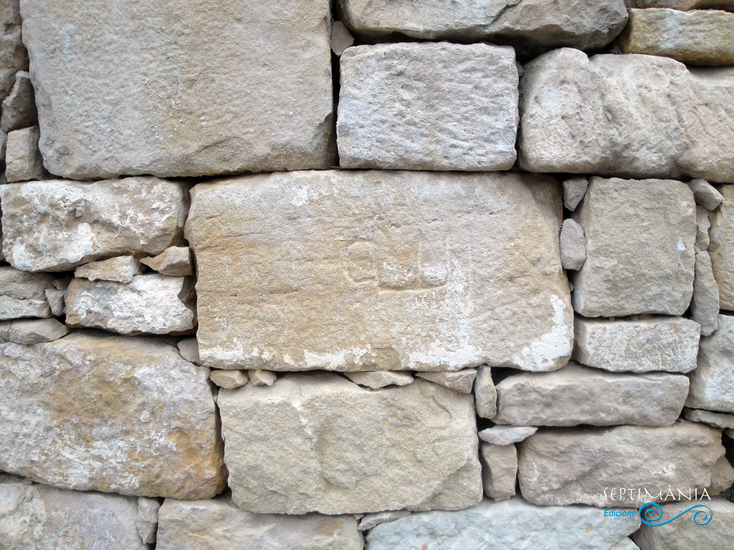 22.04.2019 Inscripció àrab provinent de l'antiga mesquita. Ara visible en un mur de la placeta entre el castell i l'antiga església.  La Granadella. -  Jordi Bibià